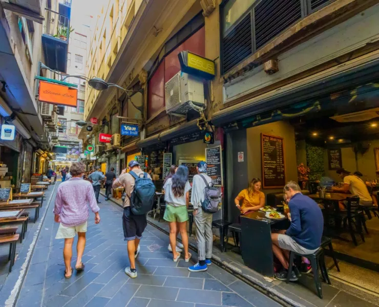 Group of people checking out laneway sign